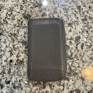 Authentic Louis Vuitton tiaga zippy coin